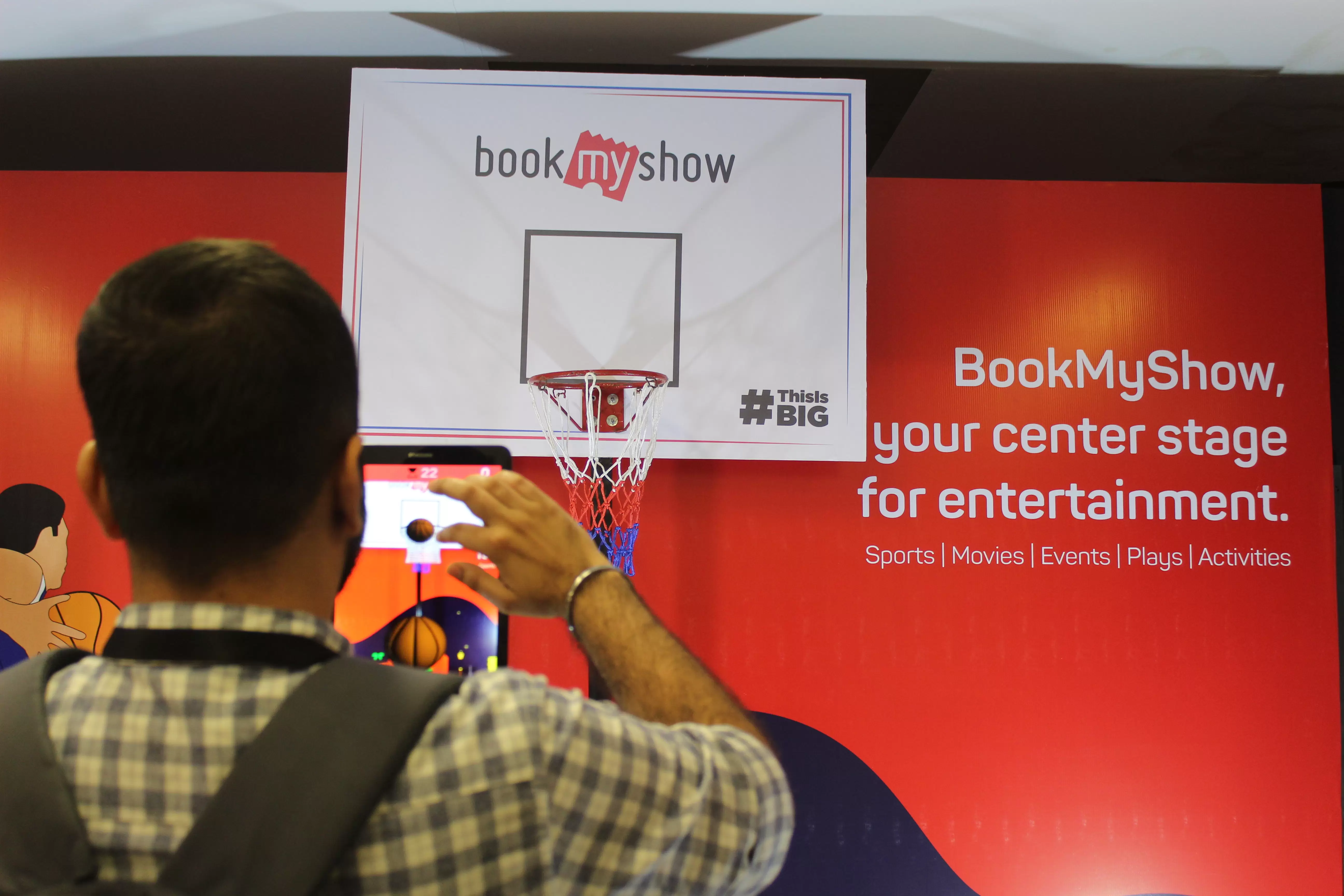 Augmented reality basketball game rental featuring a digital scoring system and physical basketball hoop for brand activations, exhibitions, roadshows, product launches, and corporate events by Fabx Events.