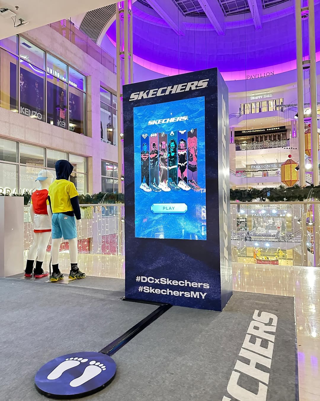 Motion-activated stepping game rental by Fabx Events featuring a touchscreen display and foot sensor platform for shopping mall activations, product launches, roadshows, and experiential marketing events.