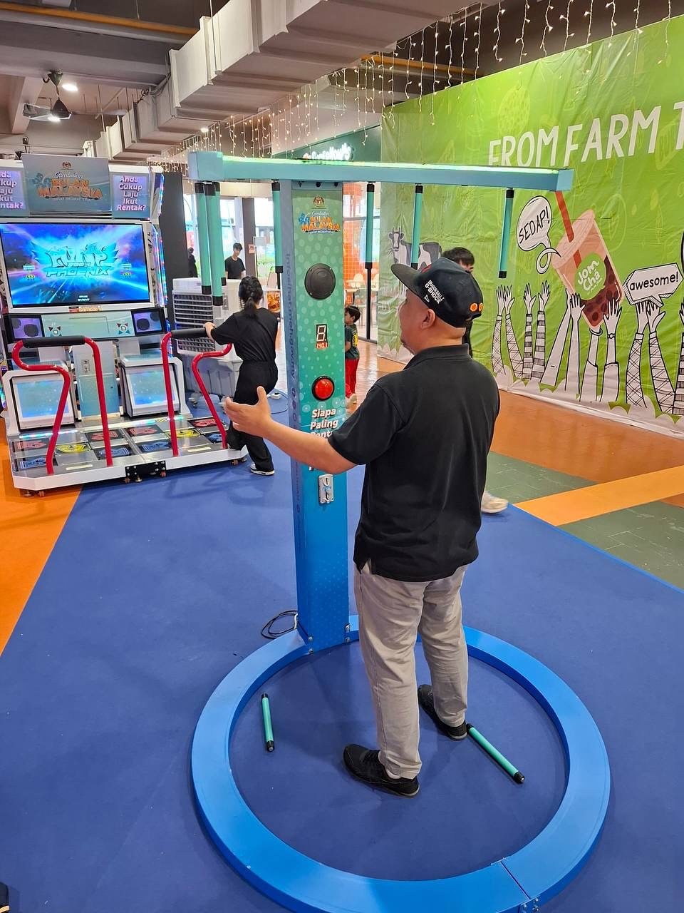 Guy playing catch the stick game.